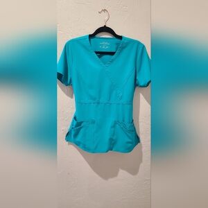 Set of 2 scrub tops. Stretch material. Small